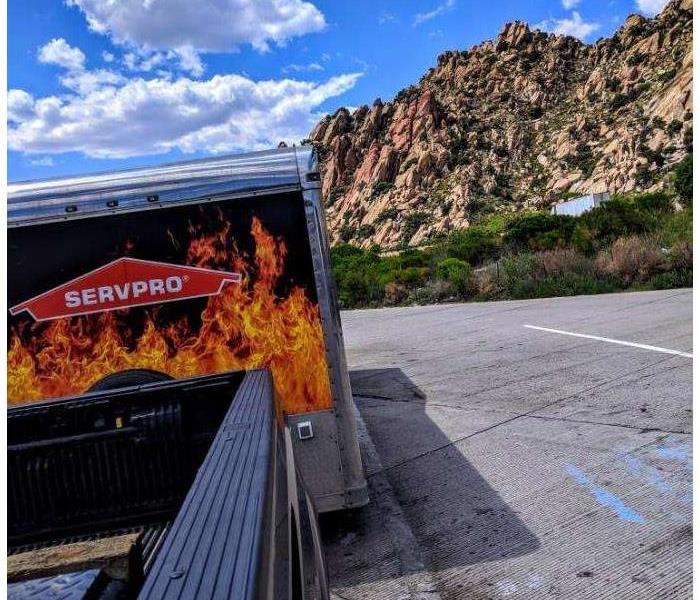 SERVPRO trailer parked in front of mountains. 
